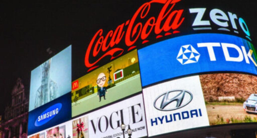 branding billboard london night time
